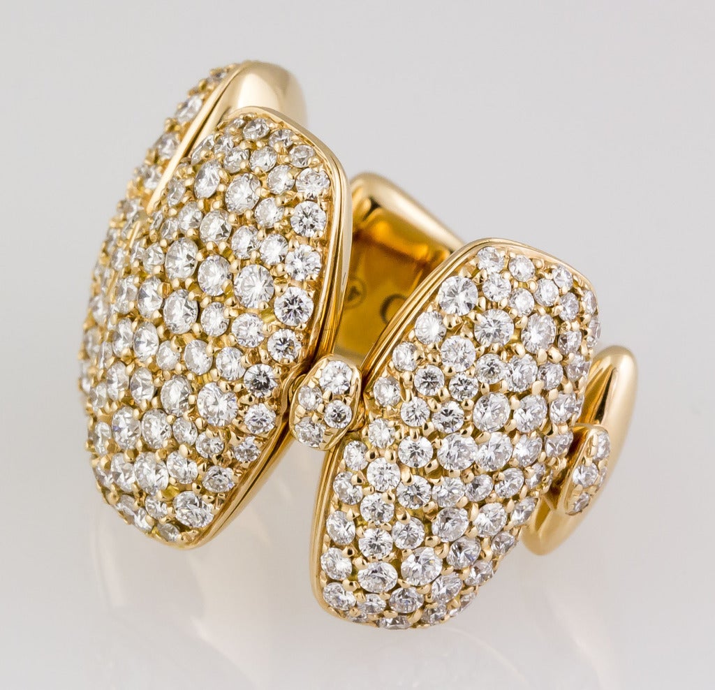 Stylish and unusual 18K gold and diamond ring from the 