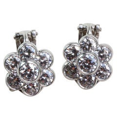 VAN CLEEF & ARPELS Diamond and Platinum Flower Earclips