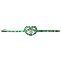 LACLOCHE FRERES Emerald and Diamond Knot Brooch
