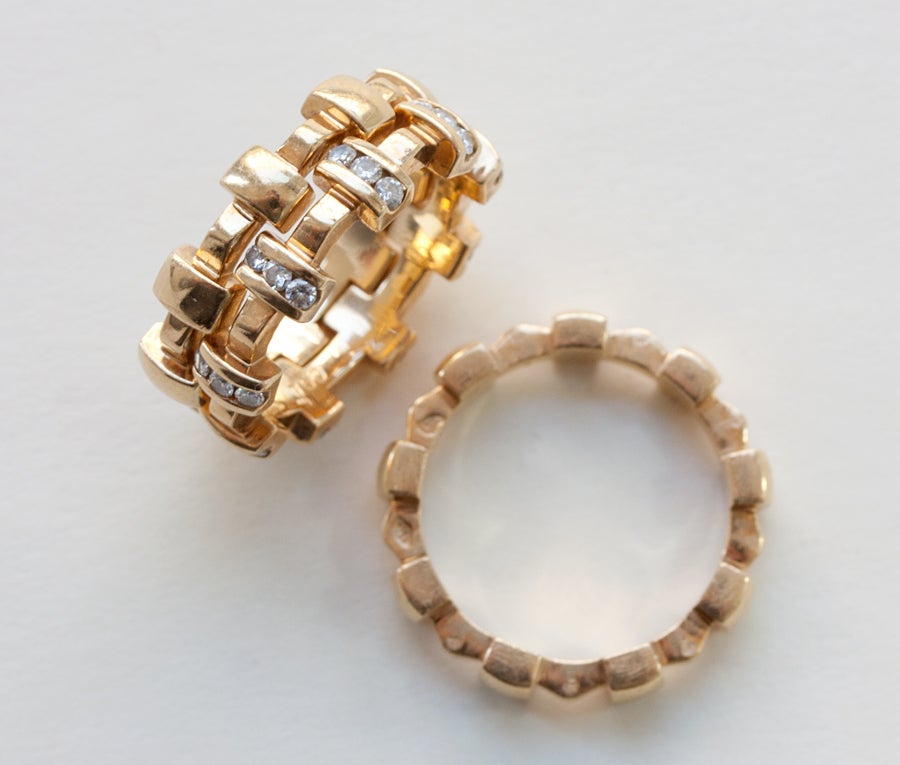three 18 carat gold stacking rings - model Palissade - (of which one is set with circa 0.3 carats of diamond), each signed and numbered: Chanel, France, circa 1980.

weight: 15.5 grams
ring size:16 mm 5 ¼ US
