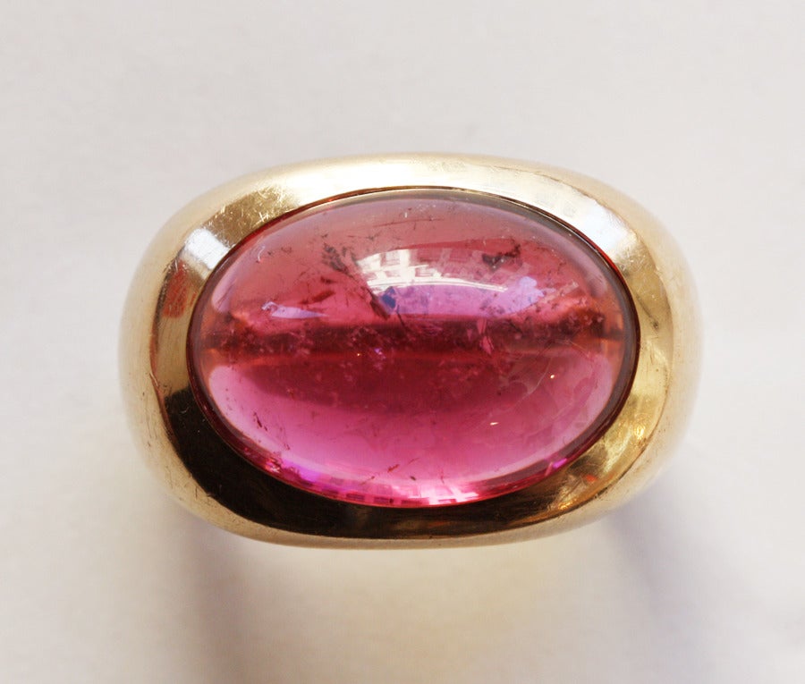 A heavy 18 carat ring set with a large pink reddish rubellite (tourmaline) of circa 25 carats, circa 1980 with masters mark.

weight: 26.8 grams
ring size: 17 mm. 6 1/2 US.