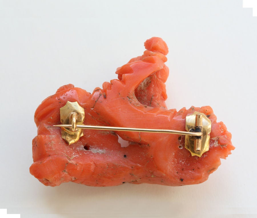 Women's coral brooch and sculpture For Sale
