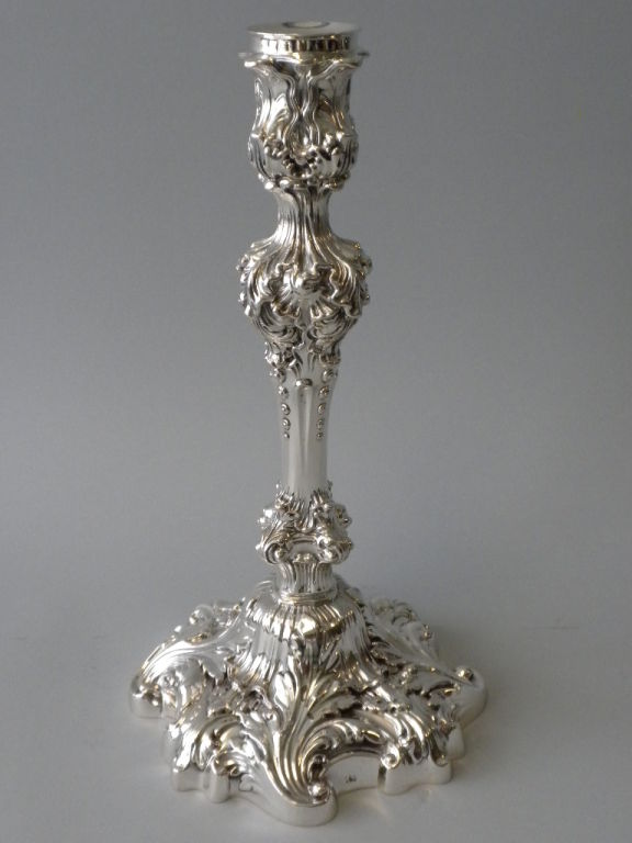 This magnificent pair of American Sterling Silver 6-Light Candelabra was made by Howard & Co., New York, in 1902. The bases are marked with Howard & Co., Sterling, New York and 1902 for the year the candelabra were made.  The bases are weighted, but