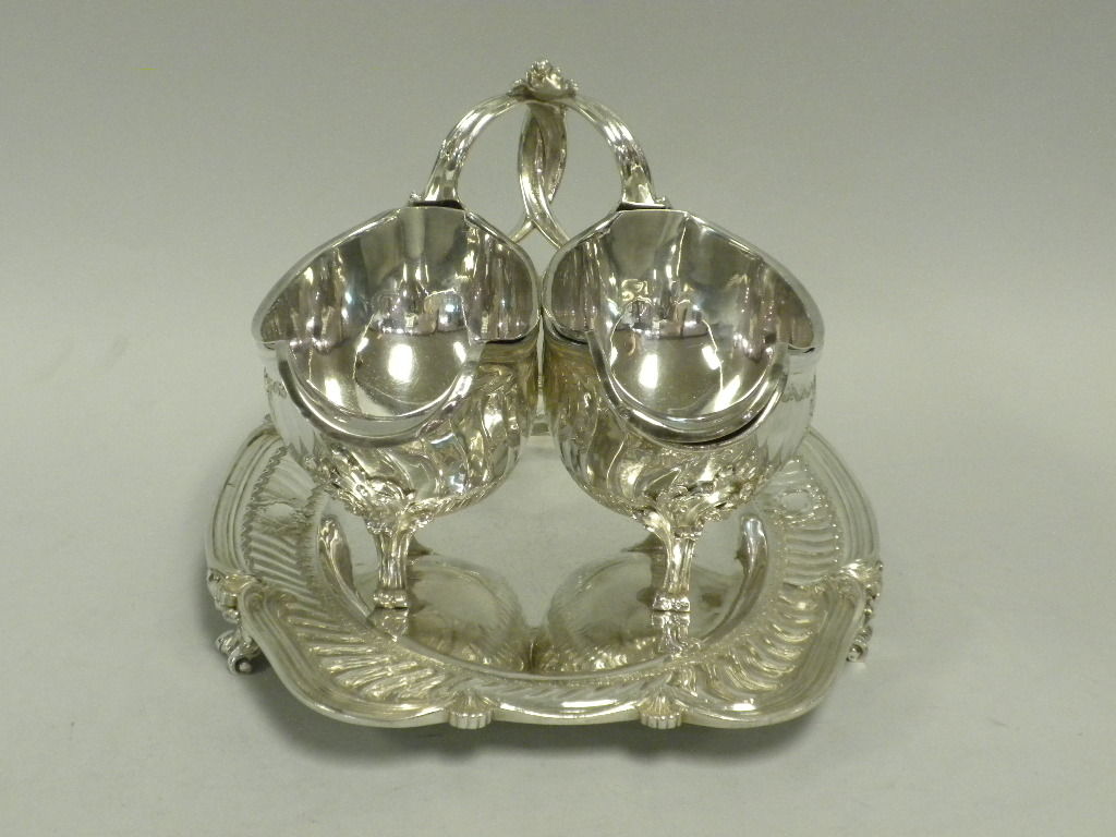 This is one of the most magnificent French 1st Standard Silver double sauceboats on stand with liners we have ever had in our store.  The sauceboats, detachable liners and four-footed stand are each hallmarked with Bointaburet’s maker’s mark, 1st