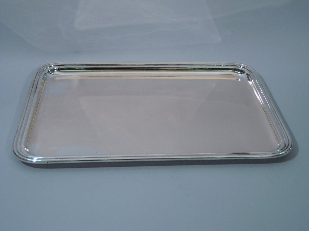 click to view larger pictures

Modern 800 silver serving tray. Made by Greggio Rino in Padua. Rectangular with curved sides and molded rim. Hallmarked. Excellent condition. 

Dimensions: H ¾ x W 18 1/3 x D 13 1/3 in. Weight: 49 troy ounces. BH676