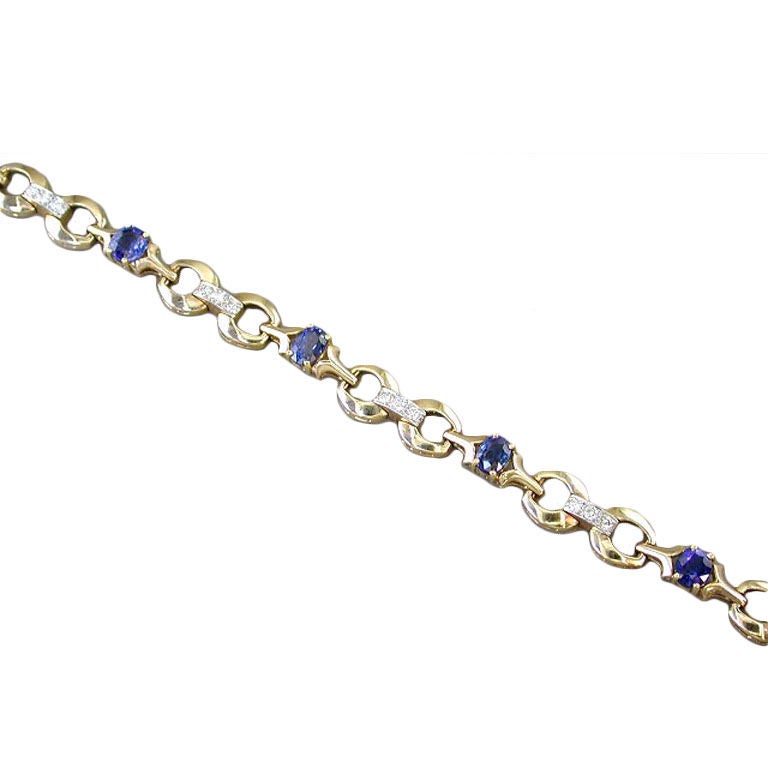 Charming sapphire, diamond & gold bracelet by Tiffany For Sale