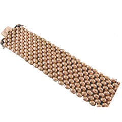 Distinctive wide,  18kt gold, flexible bracelet