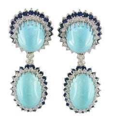 Turquoise drop earrings with diamond and sapphire surround