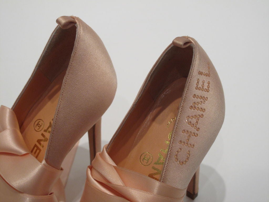 Chanel Shoes...Never worn collectors item in blush pink satin w/Ribbon Lace Up (Ballerina Toeshoe) style heels.  As seen on Sarah Jessica Parker in 
