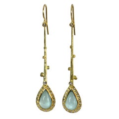 Elegant Gold Earrings with Teardrop Aquamarines & Diamonds