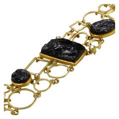 Gold Bracelet with Diamonds 
Black Tourmalines
