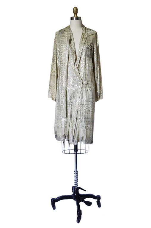 This is a spectacular, all original 1920s Assuit Flapper coat. The technique used to make this has been done for a very very long time and is still done today but not to the same degree and quality of the pieces done in the twenties. You will often