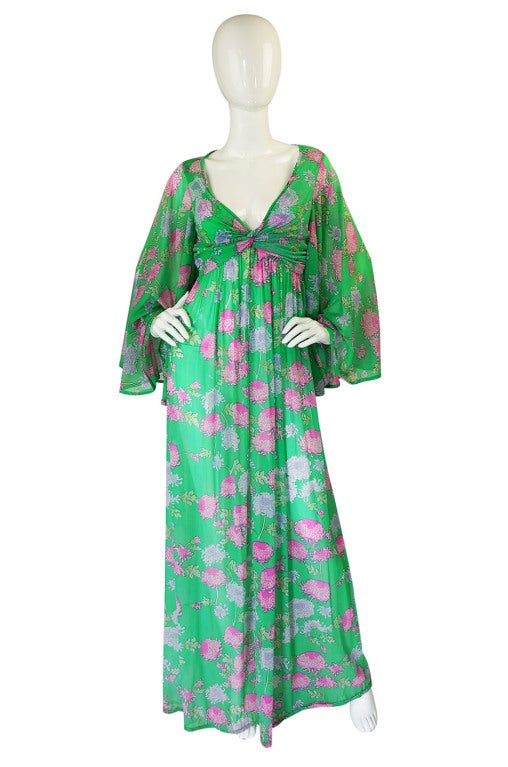 Like the other Mortan dress I have listed this is also a fantastic bright kimono inspired maxi dress. This one is a wonderful combination of green and pink florals! The fabric is so easy to wear - it is that slinky lingerie weight nylon jersey that