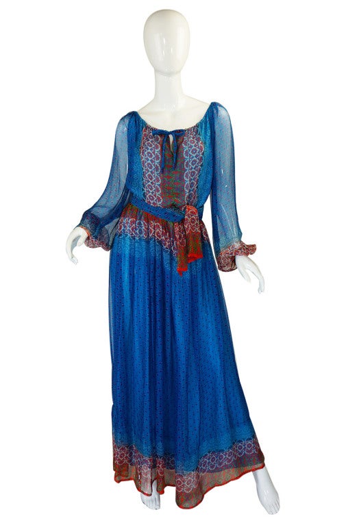 This is a very rare and beautiful Bellville Sassoon silk chiffon dress that has been done on the most amazing colors! The Sassoon label shot to absolute infamy when they dressed Princess Diana shortly after her engagement. The gown has a soft, sexy,