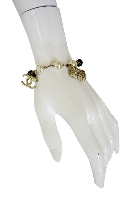 Women's Chanel Pearl & Bag Charm Bracelet For Sale