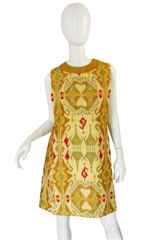 This is an absolutely amazing and very rare, early piece from Pierre Cardin. Though perhaps not the typical graphic piece one has in mind for Cardin, it is both subtly and strikingly beautiful. The textile itself is just beyond amazing - it is hand
