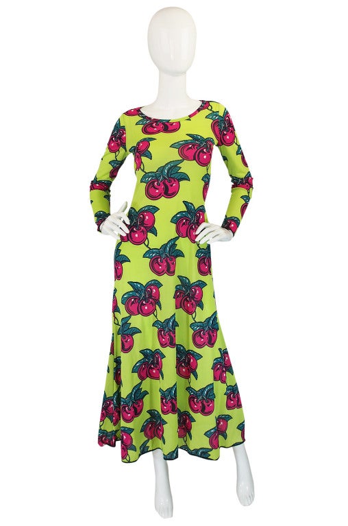 Iconic! The vibrant cherry print on a vivid lime green nylon jersey says it all!A print that Betsy revisited throughout her career is perhaps shown here for the first time! The cut is simple and it slips on to wear. Ships professionally dry