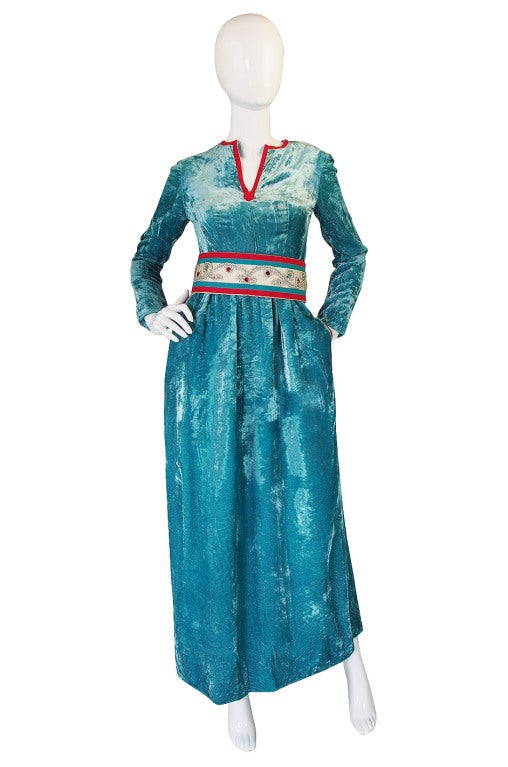 The twin of this stunning blue crushed velvet maxi dress by Oscar de la Renta is held in the Goldstein Museum of Design (the last photo is their collection archive photo) and they have this dated as being from the 1960-1965 period. Simple lines are