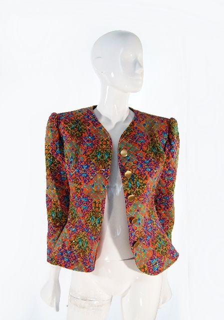 Anything YSL screams out fabulous and I love this quilted jacket that seems to have that Russian inspiration Yves so loved to add to his pieces. The colors are far more orange, blue and green then what are shown in the photographs so its much