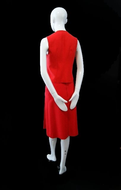 This is a fabulous and rare, 1970s two piece vest topped suit from the french house of Celine. Celine is making a bit of a comeback these days and that is sure to spur the collectibility of older pieces to new heights! This is a mint condition two