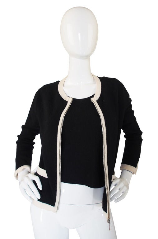 A fantastic Chanel 100% cashmere twinset that is a classic basic and will never go out of style. Made of the finest cashmere it is luxurious and feels amazing on! This came out an estate of an extremely wealthy woman who bought Chanel like mad and
