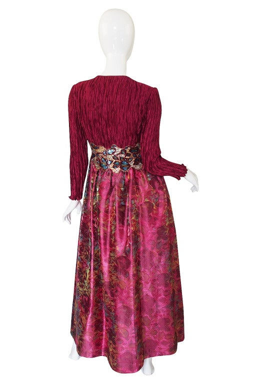 In 1975 Mary McFadden invented a pleated technique that was a nod to Fortuny but was done in a polyester fabric and whose pleating was permanent. This fabrication became her trademark and was considered cutting edge at the time. This particular gown