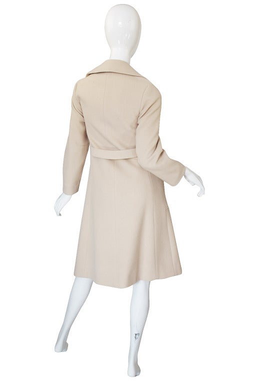 Cashmere is always a luxury experience and when you can find a vintage version it is even better. This lovely little early 60s coat by Helen Wolff is just a jewel! Made of a pale camel and a thick ply cashmere cut in that perfect little sleek