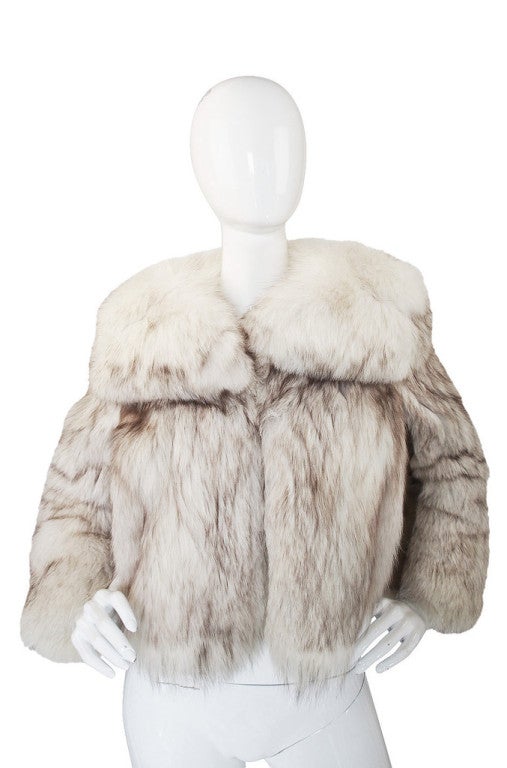 Fantastic and very rare Galanos jacket in an outstanding white tipped fox mixed with suede insets. The fur is thick and supple and it was definitely stored properly and cared for and appears to have been worn very little if at all. In fact, it feels
