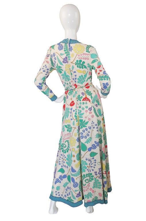 This is an absolutely beautiful silk jersey Bessi dress and one of my favorites from all the Bessi's I have had over the years! The print is spectacular - you can easily see her days at Pucci strongly influencing the design. The colors are all