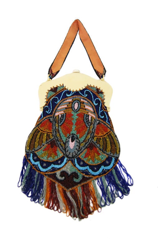 Truly a one of a kind find, this bag is straight from the revered collection of one of my best girl's who has finally been convinced to let it go. Its spectacular - really a work of art. Late 1900s the bag is fully beaded and quite large for this