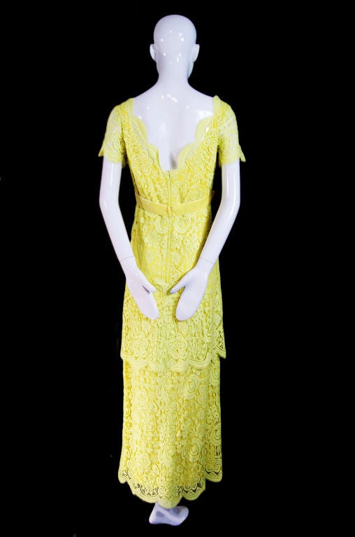 Gorgeous and classic tiered lace dress from Helen Rose, who designed her own label and worked as a costume designer for MGM. One of her biggest fans and biggest star that often appeared in her pieces was Elizabeth Taylor and boy does this look like