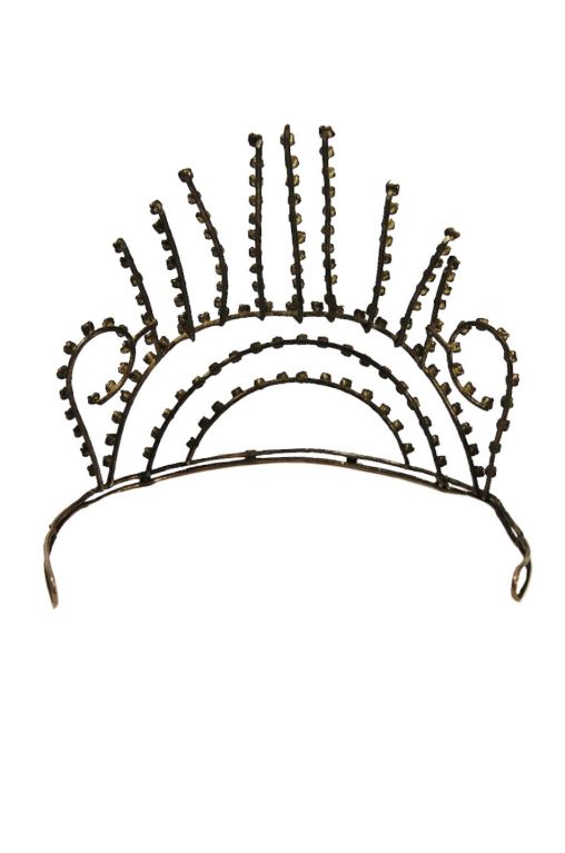 This is an interesting piece. My client purchased it from a woman who collected antique costumes. She was told this was a tiara that had been used in the Ziegfeld Follies Productions around 1924-25. The Follies, where of course famous for their