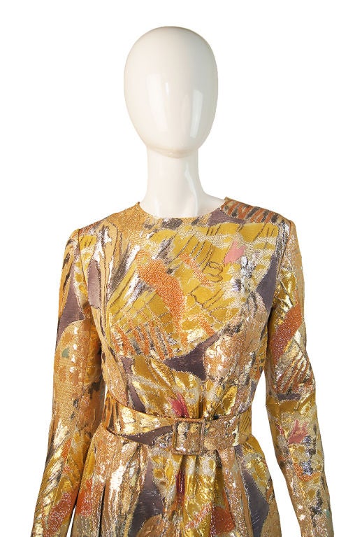 Amazing silk metallic brocade gown from Givenchy is from the late sixties, early seventies and is to die. The fabric is shockingly light - at first glance you would think it is a heavy weight stiff brocade but it is actually quite light. Its heavy