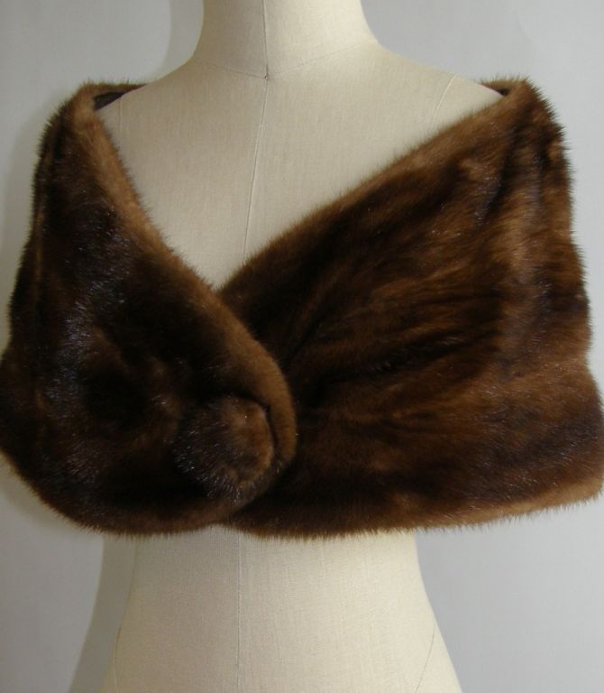 Very chic brown mink stole, circa late 1950's.  In great condition.  Buttons in the front, very chic.