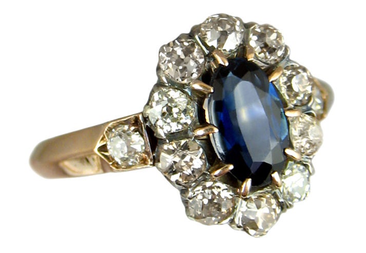 Turn Of The Century Sapphire and Diamond Cluster Ring