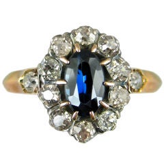 Turn Of The Century Sapphire and Diamond Cluster Ring Turn Of The Century Sapphire and Diamond Cluster Ring