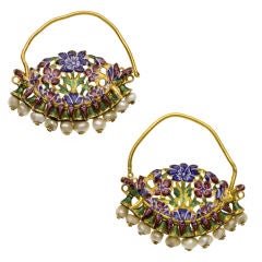 A PAIR OF GOLD AND ENAMEL EARRINGS