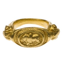 An Indian gold ring with nandi