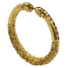 Antique Indian Gold bangle with rubies.