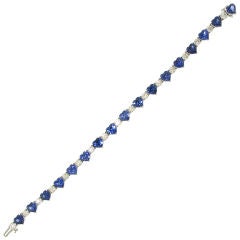 Electric Blue Heart Shaped Sapphire & Round Diamond Bracelet