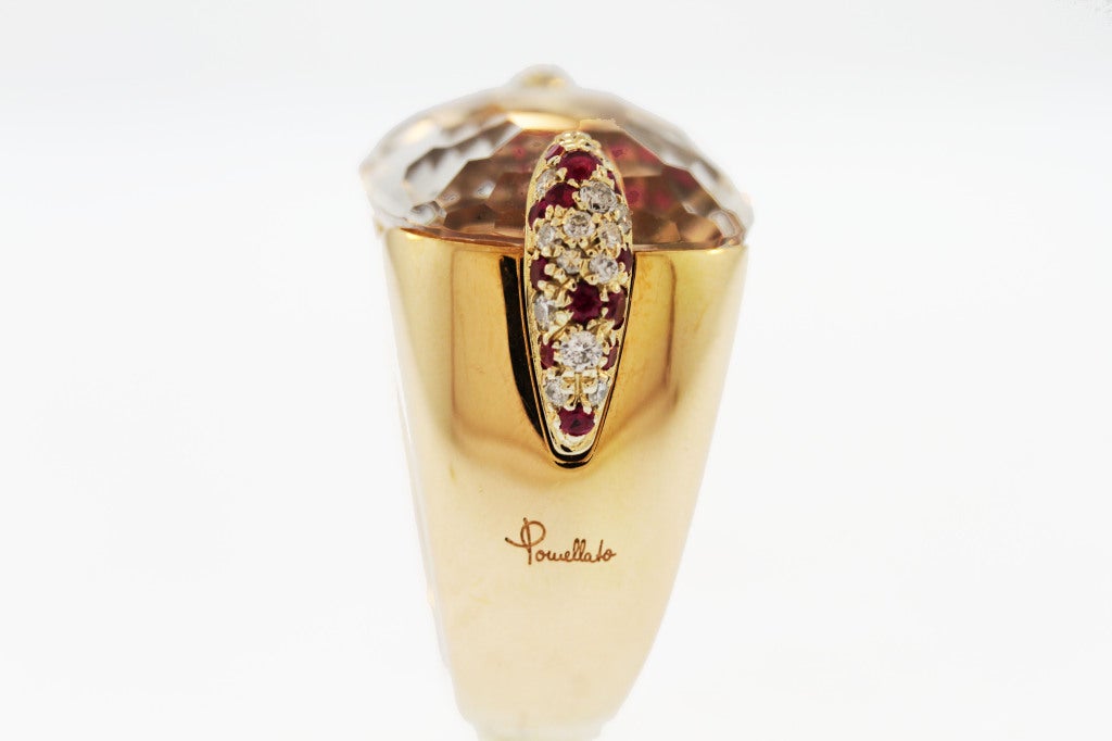 Nice heavy feel to this Pomellato ring with large clear rock crystal center stone in Pomellato's unique pink gold look.  Finger size is 7 but can be sized.