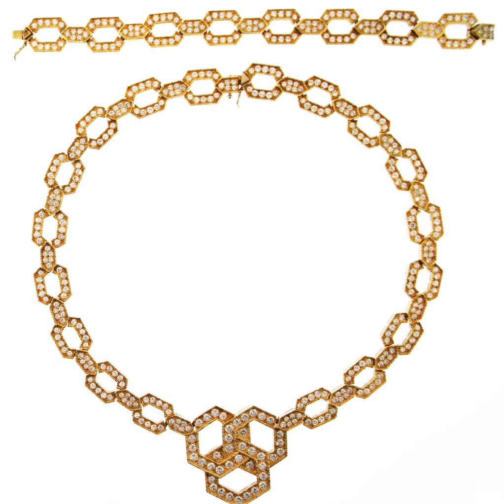 This geometric inspired necklace separates into two parts providing the option for a bracelet along with a shorter necklace.  Made by the legendary firm Van Cleef & Arpels, this piece features approximately 28.00 carats in diamonds. Accompanied by a