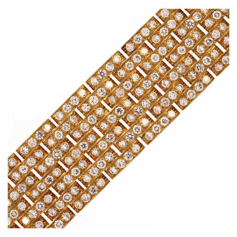 The classic Panthère bracelet made by Cartier but wider than usual - 7 rows! It is a great wearable piece for any occasion.  Featuring approximately 20.00 carats, each link is covered in diamonds.