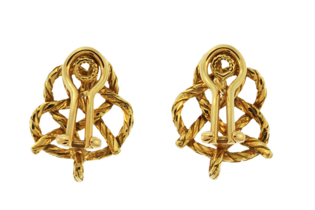 A Pair of 18 karat yellow gold 'Crepe de Chine' earclips, of twisted gold rope design, gross weight 11.2 grams, measuring 7/8 by 5/8 by 1/4 inch, signed Buccellati, Italy.