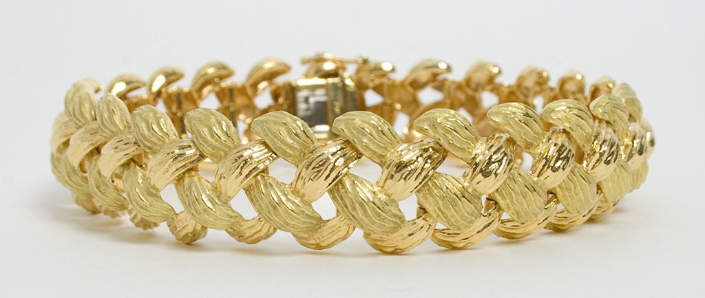 Eighteen karat gold lattice design bracelet with slightly domed links. They alternate glossy and matte finishes. Excellent condition; European origin. Measures 3/4