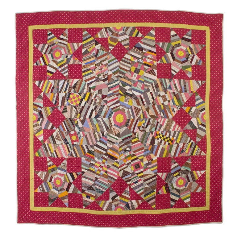 Dynamic and most unusual String Stars Quilt from Lancaster County, Pennsylvania. Although it is primarily done as a string star, the maker used some whimsey in inserting bits of traditional patterns such as Wild Goose Chase and Sixteen Patch.