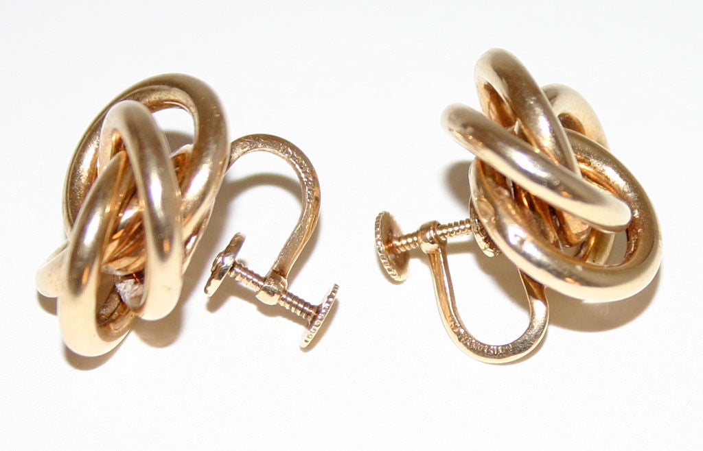 These are an early version of Tiffany's Love Knot Earrings. They are 14 karat gold; measure 7/8