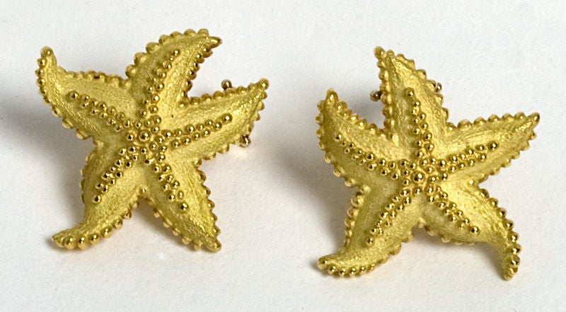 Eighteen karat gold Starfish earrings by Tiffany and Co. Wonderful texture and detail. Measure 1