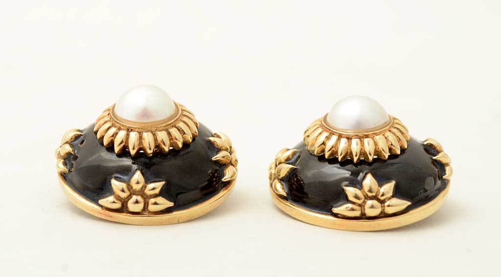 Very large, stylized flower motif earrings made of gold, enamel and a central pearl. They are a set with item JU120528133322 but are being offered separately. The earrings measure 1 1/8