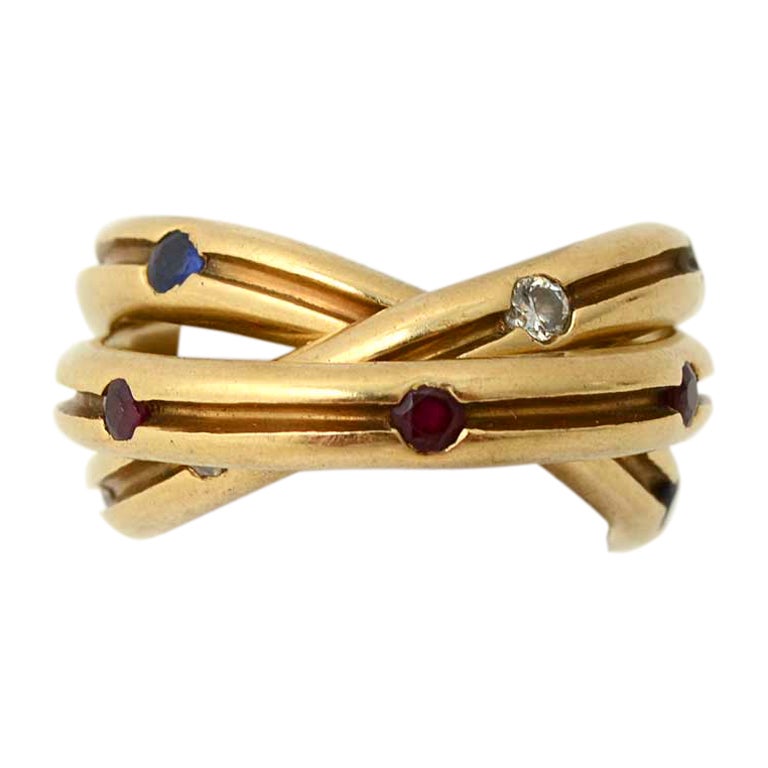 CARTIER  Rolling Ring with Diamonds, Rubies and Sapphires